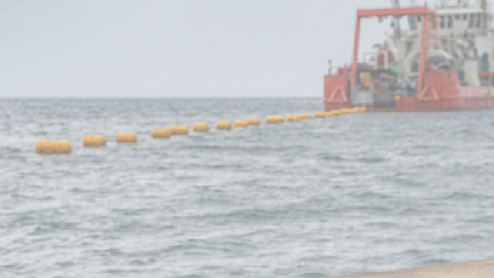 Report cover with photo of wharf and cable ship and title of report.